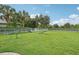 Well-maintained community dog park with agility equipment, fencing, and lush green grass at 2240 Crystal Lake Trl, Bradenton, FL 34211