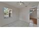Bright bedroom featuring a ceiling fan, and tiled flooring at 2411 5Th Avenue E Dr, Palmetto, FL 34221