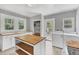 Charming kitchen with wood counters, bright windows, and access to laundry and back entry at 2529 7Th W Ave, Bradenton, FL 34205