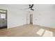 A bright bedroom featuring hardwood floors, closet and access to the bathroom at 2655 Bay St, Sarasota, FL 34237
