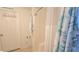 A clean bathroom features a built-in shower, towel rack and a charming sign at 3333 26Th E Ave # 1132, Bradenton, FL 34208