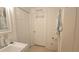 Bright bathroom with a classic white color scheme and ample storage, including a unique towel rack at 3333 26Th E Ave # 1132, Bradenton, FL 34208