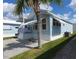 Charming light blue single-story home with well-maintained yard and white trim at 3333 26Th E Ave # 1132, Bradenton, FL 34208