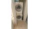 Stacked washer and dryer unit tucked beside a closet in the laundry area at 3333 26Th E Ave # 1132, Bradenton, FL 34208