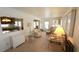 Cozy living room with comfortable seating, bright windows, and calming decor at 3333 26Th E Ave # 1132, Bradenton, FL 34208