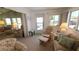 Cozy living room with comfortable seating, bright windows, and calming decor at 3333 26Th E Ave # 1132, Bradenton, FL 34208