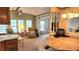 Open-concept living area featuring views of the dining space, large windows, and comfortable seating at 3333 26Th E Ave # 1132, Bradenton, FL 34208