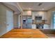 Updated kitchen with stainless steel appliances, white cabinetry, and butcher block countertops at 4102 Lakewood Ave, Bradenton, FL 34208