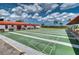 Well-maintained shuffleboard courts with covered benches, providing a social recreation area at 4102 Lakewood Ave, Bradenton, FL 34208
