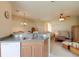 Open-concept living room, featuring a ceiling fan, and lots of natural light at 4103 Foristall Ave # 4103, Sarasota, FL 34233