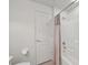 Clean bathroom features a shower-tub combo, neutral tile, and standard-height toilet at 4254 Vicenza Dr # B, Venice, FL 34293