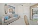 Cozy bedroom decorated with coastal decor featuring a sofa bed and a workspace at 4254 Vicenza Dr # B, Venice, FL 34293