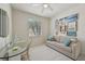 A bedroom with surf decor, bright, clean furniture, and light colored paint at 4254 Vicenza Dr # B, Venice, FL 34293