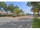 Gated community entrance with lush landscaping and secure access at 4254 Vicenza Dr # B, Venice, FL 34293