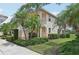 Beautiful two-story condo building with well maintained yard and landscaped with palm trees at 4254 Vicenza Dr # B, Venice, FL 34293