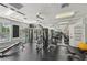Bright gym featuring modern exercise equipment, mirrored wall and lots of natural light at 4254 Vicenza Dr # B, Venice, FL 34293