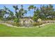 Scenic water feature with a pond, waterfall, and lush landscaping at 4254 Vicenza Dr # B, Venice, FL 34293