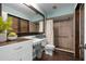 Modern bathroom with decorative shower, vanity and fixtures at 4405 Linwood St, Sarasota, FL 34232