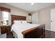 Spacious main bedroom with dark hardwood floors and large window at 4405 Linwood St, Sarasota, FL 34232