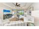 Cozy living room with a seamless transition to the screened-in patio at 4416 Amalfi Ave, Sarasota, FL 34243