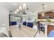 Bright living space with dining area, and view of outdoor living space at 4416 Amalfi Ave, Sarasota, FL 34243