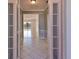 Inviting entryway with light gray walls and decorative trim leads into the home at 4627 56Th E Dr, Bradenton, FL 34203