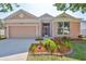 Beautiful home with a well-manicured lawn and a two-car garage, located in a quiet neighborhood at 4627 56Th E Dr, Bradenton, FL 34203