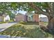 Charming home with a well-maintained front yard and mature trees at 4627 56Th E Dr, Bradenton, FL 34203