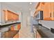 Spacious kitchen featuring granite countertops, stainless steel appliances, and ample cabinet space at 4627 56Th E Dr, Bradenton, FL 34203