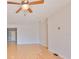 Spacious living room features a ceiling fan and views of the entry at 4627 56Th E Dr, Bradenton, FL 34203