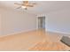 Bright living room with wood flooring and ceiling fan at 4627 56Th E Dr, Bradenton, FL 34203