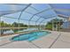 Screened pool with clear blue water and a scenic lake view at 4627 56Th E Dr, Bradenton, FL 34203