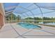 Enclosed pool with scenic lake views and ample sunshine at 4627 56Th E Dr, Bradenton, FL 34203