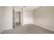 The bedroom has tile flooring and a closet with louvered doors at 4812 Greywood Ln, Sarasota, FL 34235