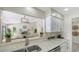 Modern kitchen with granite countertop and an open view to the spacious living room at 4812 Greywood Ln, Sarasota, FL 34235
