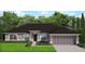Charming single-story home with manicured lawn, attached two-car garage, and professionally landscaped front at 4843 Laskey Ave, North Port, FL 34288