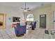 Comfortable living room features tiled flooring, vaulted ceiling, and plenty of natural light at 5530 21St Street E Ct, Bradenton, FL 34203