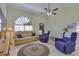 Cozy living room with tile floors, neutral paint, and comfortable furnishings at 5530 21St Street E Ct, Bradenton, FL 34203