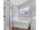Spacious bathroom featuring separate shower, soaker tub, and vanity at 5561 Burnt Branch Cir, Sarasota, FL 34232