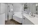 Bathroom featuring a tub, shower, and single sink vanity at 5561 Burnt Branch Cir, Sarasota, FL 34232