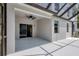 Enjoy outdoor living on this covered patio, featuring ample space for seating and relaxation at 5561 Burnt Branch Cir, Sarasota, FL 34232