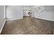 Spacious living room features modern floors and an open floorplan at 5561 Burnt Branch Cir, Sarasota, FL 34232