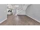 Inviting living space features hardwood floors and an open layout, connecting seamlessly to the kitchen and dining areas at 5561 Burnt Branch Cir, Sarasota, FL 34232