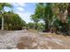 A community fishing pier with access to a calm lake at 5750 Carriage Dr, Sarasota, FL 34243