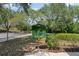 A community library stand offering books to borrow at 5750 Carriage Dr, Sarasota, FL 34243
