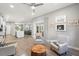 Inviting living space flows from the kitchen, offering comfortable seating and natural light at 5750 Carriage Dr, Sarasota, FL 34243