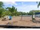 A community playground with climbing dome, swings and slide at 5750 Carriage Dr, Sarasota, FL 34243