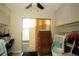 Bonus room with wood look flooring and sliding doors to exterior at 603 Saint Andrews Dr, Sarasota, FL 34243