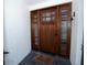 Elegant front door with glass panels and sidelights, creating a grand entrance at 603 Saint Andrews Dr, Sarasota, FL 34243