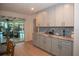 Kitchen with ample cabinet space, modern appliances, and a view of the pool at 603 Saint Andrews Dr, Sarasota, FL 34243